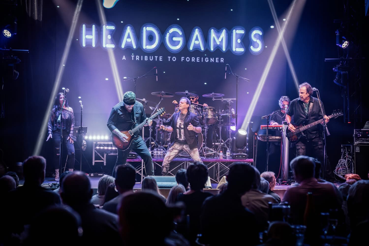 Head Games performing live on stage at MadLife Stage & Studios